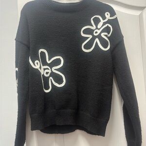 SHEIN Black Sweater with White Floral Design